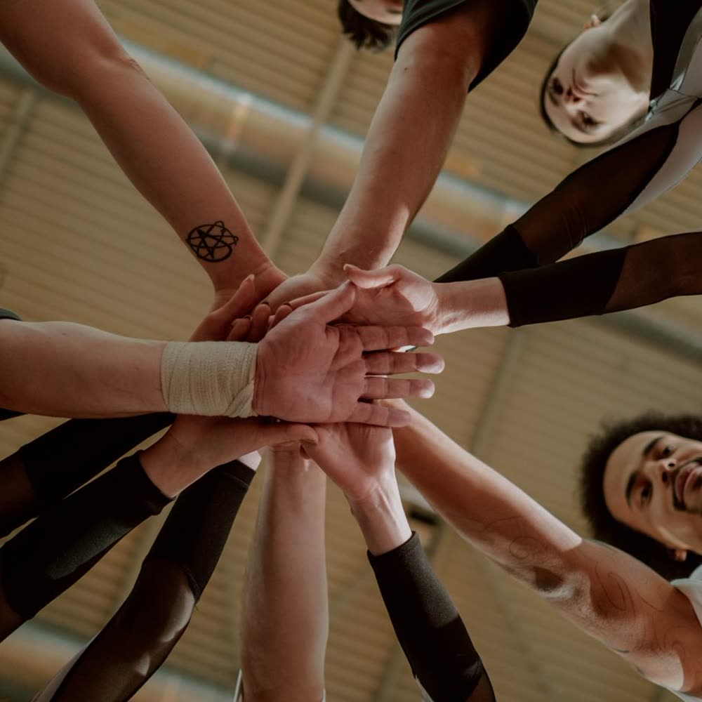 Community — hands joined together